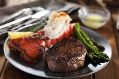 steak and lobster surf & turf gourmet dinner with asparagus
