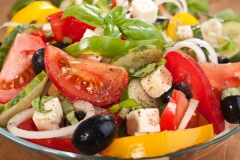 close up healthy greek salad with ingredients