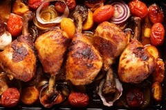 Roasted chicken legs with vegetables