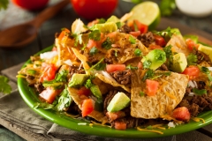 Loaded Beef and Cheese Nachos with Cilantro and Lime